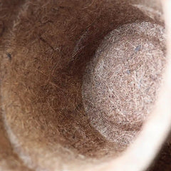 maceta de fibra de coco en diseño de cubeta